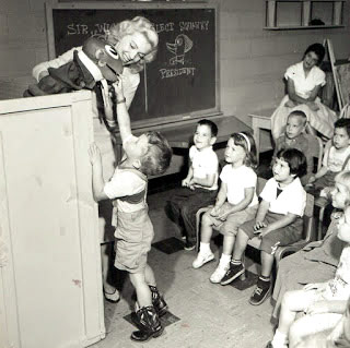 Angel Casey and Bruce Newton on a live remote in a Chicago public school, guiding the kids through a mock election. Angel Casey and Bruce Newton on a live remote in a Chicago public school, guiding the kids through a mock election.